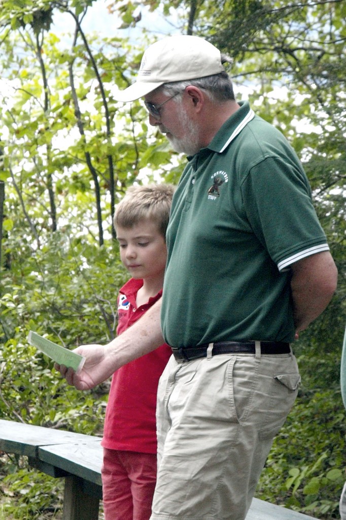 Dr. Thompson with a camper at Keewaydin Dunmore (Photos courtesy Cressy Goodwin)